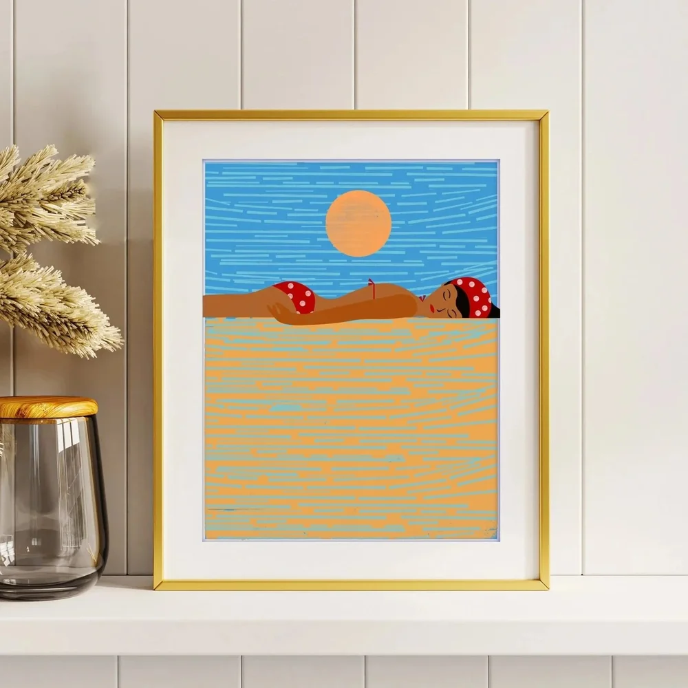Framed beach bather print by Sun Hee Studios