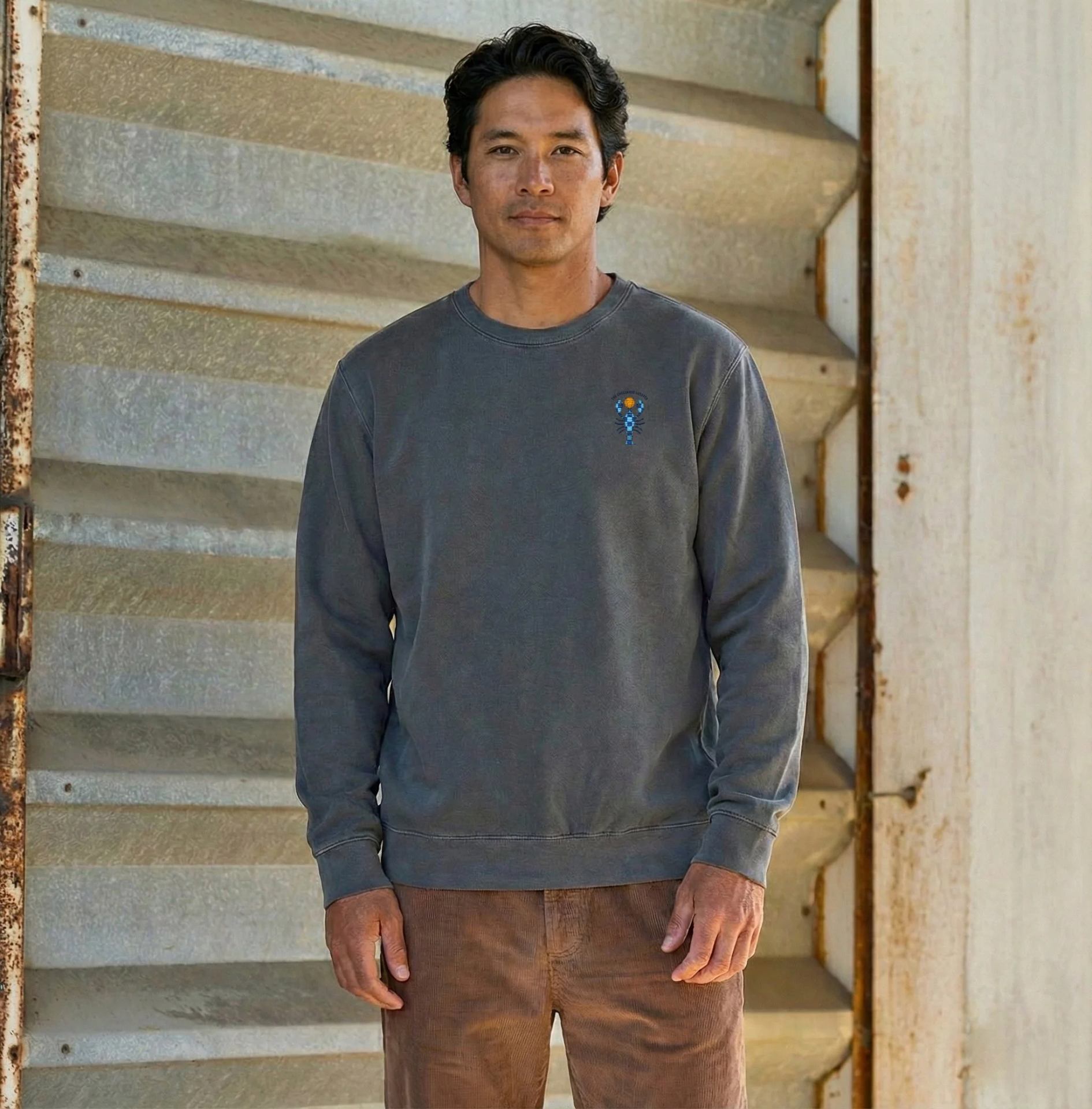 Front view of the pepper Men's Signature Crew with the embroidered Checkered Lobster at the left chest