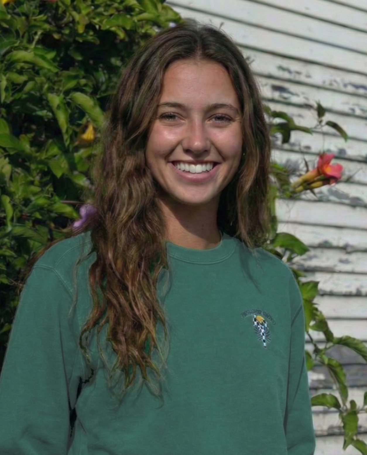 Woman wearing the Blue Spruce Women's Shoreline Crew with the embroidered Checkered Lobster at the chest