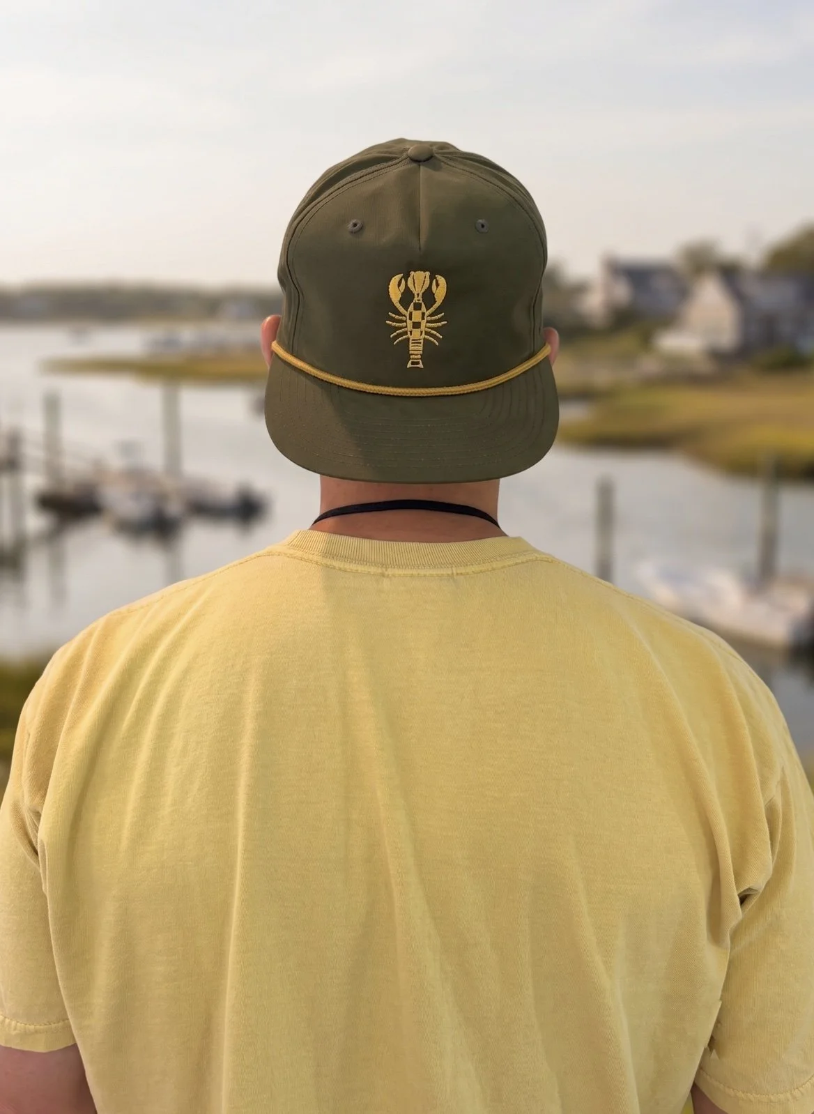 Olive rope-brim hat with an embroidered lobster