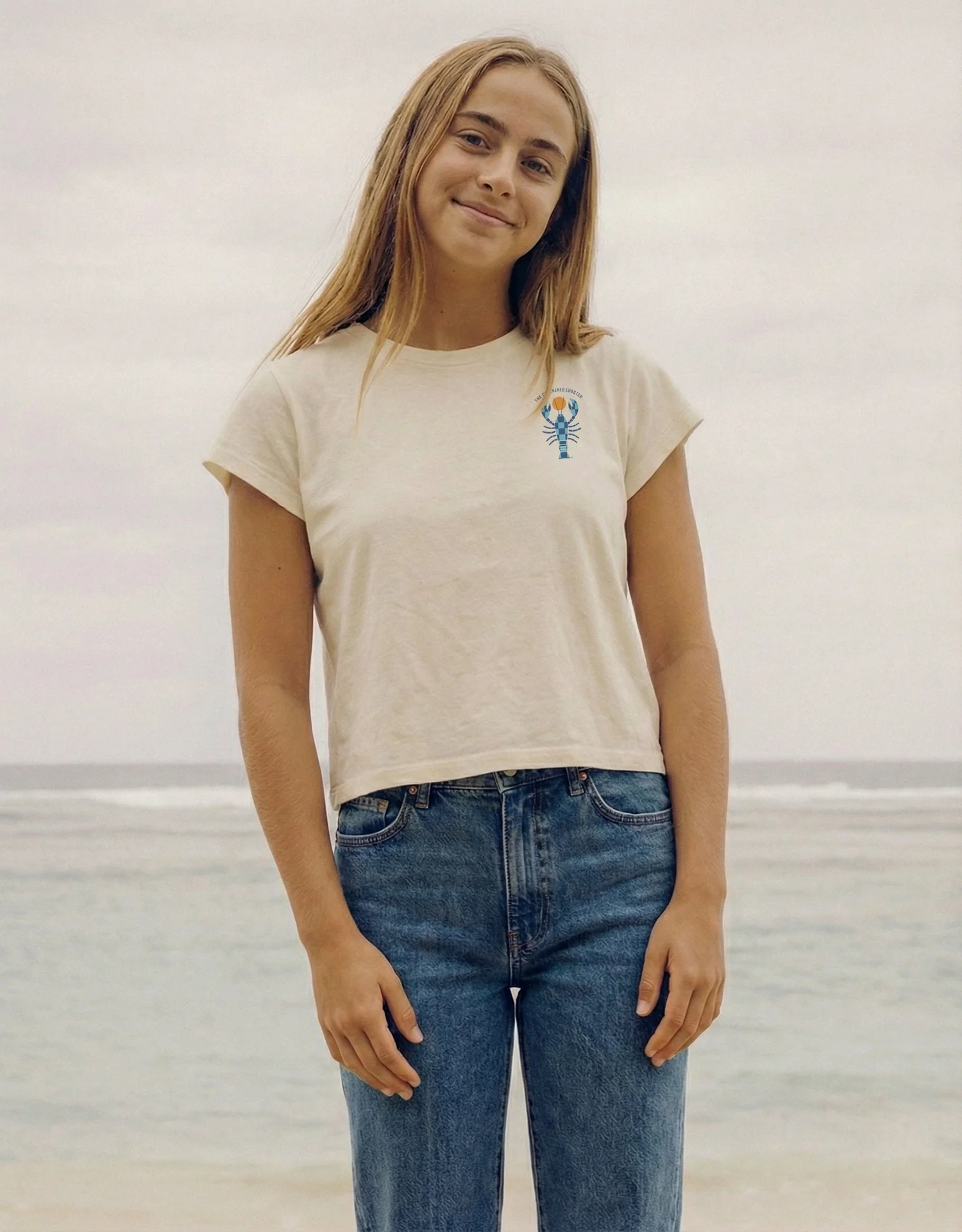 Front of the Natural Shoreline Boxy Tee with the small Checkered Lobster at the chest