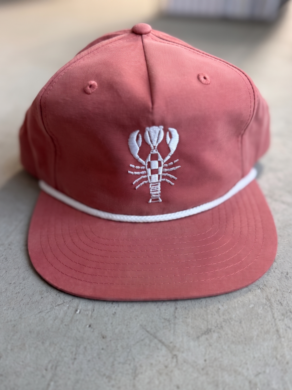 Washed Coral lobster snapback with white rope